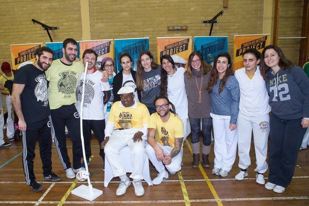 Apêiara students with a Mestre at a Tributo aos Mestres event in London